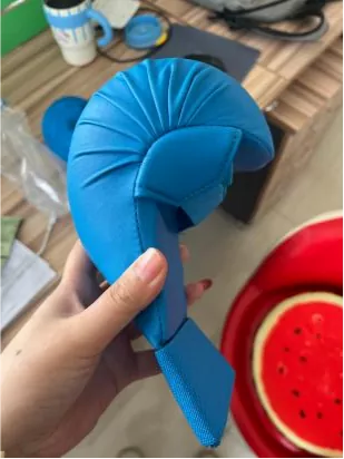 Karate hand guards in official red and blue competition colors