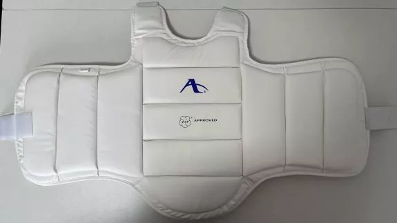 Karate chest protector with ergonomic shoulder cut and adjustable side straps